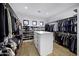 Large walk-in closet with ample shelving and hanging space at 25582 N 89Th St, Scottsdale, AZ 85255