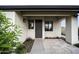 Front entrance with private courtyard and modern gray facade at 25582 N 89Th St, Scottsdale, AZ 85255