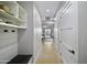 Bright hallway with light wood floors and access to backyard at 25582 N 89Th St, Scottsdale, AZ 85255