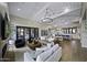 Open living space with hardwood floors and a large chandelier at 25582 N 89Th St, Scottsdale, AZ 85255