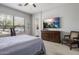 Bright bedroom with large window, comfy bed, and ample closet space at 26803 N 45Th Pl, Cave Creek, AZ 85331