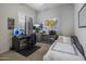 Versatile room with a desk, bed, and ample space for work and rest at 26803 N 45Th Pl, Cave Creek, AZ 85331