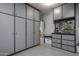 Organized garage with ample storage and workbench at 26803 N 45Th Pl, Cave Creek, AZ 85331