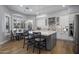 Modern kitchen with white cabinets, a large island, and stainless steel appliances at 26803 N 45Th Pl, Cave Creek, AZ 85331