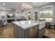 Modern kitchen features a large island, stainless steel appliances, and white cabinetry at 26803 N 45Th Pl, Cave Creek, AZ 85331