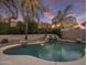 Relaxing kidney-shaped pool with waterfall feature at 26803 N 45Th Pl, Cave Creek, AZ 85331