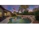 Inviting pool with waterfall and patio access at 26803 N 45Th Pl, Cave Creek, AZ 85331