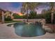 Refreshing pool with a rock waterfall feature at 26803 N 45Th Pl, Cave Creek, AZ 85331