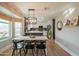 Kitchen with farmhouse dining table and modern light fixture at 2951 E Adobe St, Mesa, AZ 85213