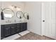 Bathroom with a double sink vanity, a double mirror, and tile flooring at 3091 E Morenci Rd, San Tan Valley, AZ 85143