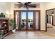 French doors open to a relaxing backyard patio area at 31048 N 56Th St, Cave Creek, AZ 85331