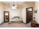 Bright bedroom with comfortable day bed and access to private balcony at 31048 N 56Th St, Cave Creek, AZ 85331