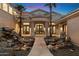 Inviting courtyard entry with a stone pathway and water feature at 31048 N 56Th N St, Cave Creek, AZ 85331