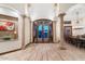 Elegant dining room with a large table, chandelier, and hardwood floors at 31048 N 56Th St, Cave Creek, AZ 85331