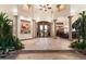 Two-story entryway with high ceilings and hardwood floors at 31048 N 56Th St, Cave Creek, AZ 85331