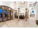 Open and bright entryway with high ceilings and a grand staircase at 31048 N 56Th St, Cave Creek, AZ 85331