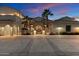 Elegant two-story home with palm trees and a large motor court at 31048 N 56Th St, Cave Creek, AZ 85331