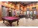 Game room with pool table, wet bar, and access to backyard at 31048 N 56Th N St, Cave Creek, AZ 85331