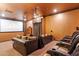 Home theater with large screen, comfortable seating, and projector at 31048 N 56Th St, Cave Creek, AZ 85331
