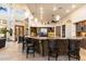 Gourmet kitchen boasts granite countertops and custom cabinetry at 31048 N 56Th St, Cave Creek, AZ 85331