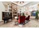 Grand living room with stone fireplace, hardwood floors, and high ceilings at 31048 N 56Th St, Cave Creek, AZ 85331