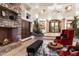 Bright living room with fireplace and comfortable seating area at 31048 N 56Th St, Cave Creek, AZ 85331