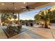 Outdoor dining area with seating for six and a view of the pool at 31048 N 56Th St, Cave Creek, AZ 85331