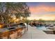 Stone outdoor kitchen with grill, sink and ample counter space at 31048 N 56Th St, Cave Creek, AZ 85331