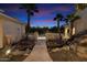 Stone pathway leading to the home with lush landscaping at 31048 N 56Th St, Cave Creek, AZ 85331