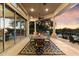 Covered patio with dining area and view of the pool and desert sunset at 31048 N 56Th St, Cave Creek, AZ 85331