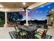 Outdoor patio with dining area, offering scenic sunset views at 31048 N 56Th St, Cave Creek, AZ 85331