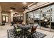 Covered patio with dining area and view into the great room at 31048 N 56Th St, Cave Creek, AZ 85331
