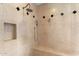 Large walk in shower with built in seat and dual shower heads at 31048 N 56Th St, Cave Creek, AZ 85331