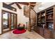 Cozy sitting area with spiral staircase and built-in shelving at 31048 N 56Th St, Cave Creek, AZ 85331