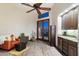 Relaxing sitting area with comfortable chair and built-in cabinets at 31048 N 56Th St, Cave Creek, AZ 85331