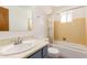 Clean bathroom with a tub, shower, and updated vanity at 4227 W Hatcher Rd, Phoenix, AZ 85051
