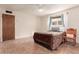 Cozy bedroom with tiled floors and ceiling fan at 4227 W Hatcher Rd, Phoenix, AZ 85051