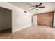 Bright bedroom with tiled floors and ceiling fan at 4227 W Hatcher Rd, Phoenix, AZ 85051