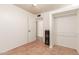 Small bedroom with tiled floors and a closet at 4227 W Hatcher Rd, Phoenix, AZ 85051