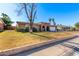 Ranch style home with a two-car garage and spacious yard at 4227 W Hatcher Rd, Phoenix, AZ 85051