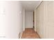 Simple hallway with tile flooring and double doors at 4227 W Hatcher Rd, Phoenix, AZ 85051