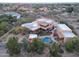Aerial view showcasing a large house, pool, and expansive backyard at 5827 N 129Th Ave, Litchfield Park, AZ 85340