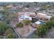 Aerial view of a luxurious home with a pool and solar panels at 5827 N 129Th Ave, Litchfield Park, AZ 85340