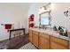Bathroom with double vanity, decorative mirrors, and plenty of counter space at 5827 N 129Th Ave, Litchfield Park, AZ 85340