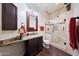 Bathroom with shower, granite vanity and a toilet at 5827 N 129Th Ave, Litchfield Park, AZ 85340