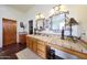 Bathroom boasts a large vanity, walk in shower, and a luxurious soaking tub at 5827 N 129Th Ave, Litchfield Park, AZ 85340