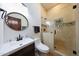 Updated bathroom with a walk-in shower and tiled walls at 5827 N 129Th Ave, Litchfield Park, AZ 85340