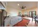 Spacious bedroom with a king-size bed and sitting area at 5827 N 129Th Ave, Litchfield Park, AZ 85340
