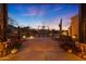 Stone courtyard with fountain and gated entry to the property at 5827 N 129Th Ave, Litchfield Park, AZ 85340