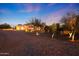 Luxury home with a long driveway and mature trees at 5827 N 129Th Ave, Litchfield Park, AZ 85340